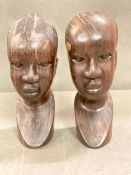 A Pair of Carved African heads.