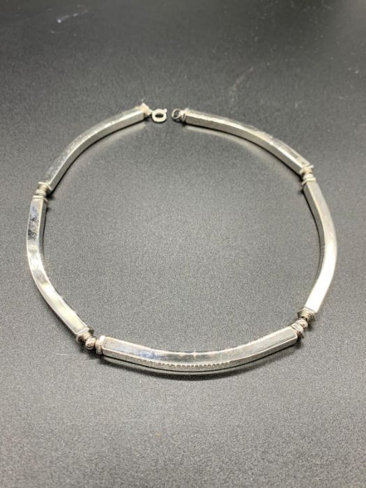 A silver jointed necklace