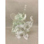 Two glass elephants