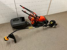 A Flymo Venturer 320 and a petrol strimmer McCulloch trimmer