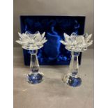 Two boxed crystal candle sticks