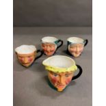 Four character cups by Thorley
