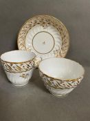 An 18th Century porcelain trio of tea bowl, cup, and saucer.