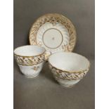 An 18th Century porcelain trio of tea bowl, cup, and saucer.
