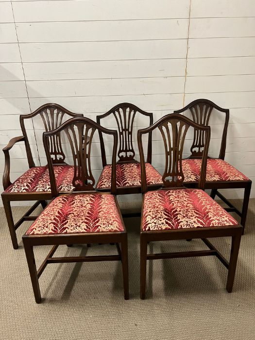 Five George III style mahogany chairs