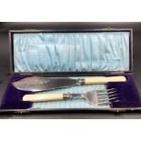 A cased set of silver mounted bone handled fish servers