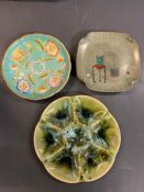 A floral ceramic Morvan fruit plate, France and a ceramic plate with a still life scene