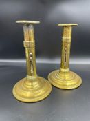 A Pair of 18th Century brass candlesticks