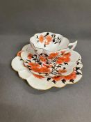 A Foley china trio of plate , tea cup and saucer with floral design.