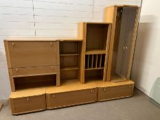 A wall unit consisting of seven units that can be arrange in different styles (Overall length