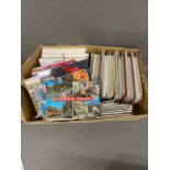 A large selection of various postcards