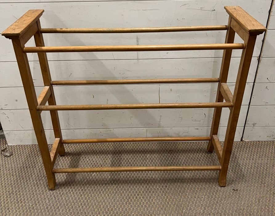 An antique pine towel rail (H72cm W79cm)