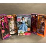 A selection of five boxed Barbies to include Halloween Glow, Enchanted Halloween, My Graduation