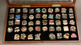 A Framed selection of railway related pin badges.