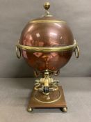 A Copper Antique Samovar with Atlas figure as stand.