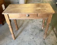 An antique pine side table with drawers (H73cm W83cm D41CM)