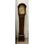 A grandmother/granddaughter eight day clock with brass face