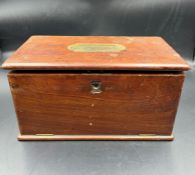 A mahogany box with drop down front