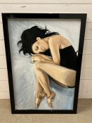 A painted canvas of a girl signed lower left (56cm x 80cm)