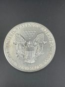 A 1992 US 1oz silver dollar