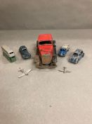 A selection of vintage toy cars and aeroplanes