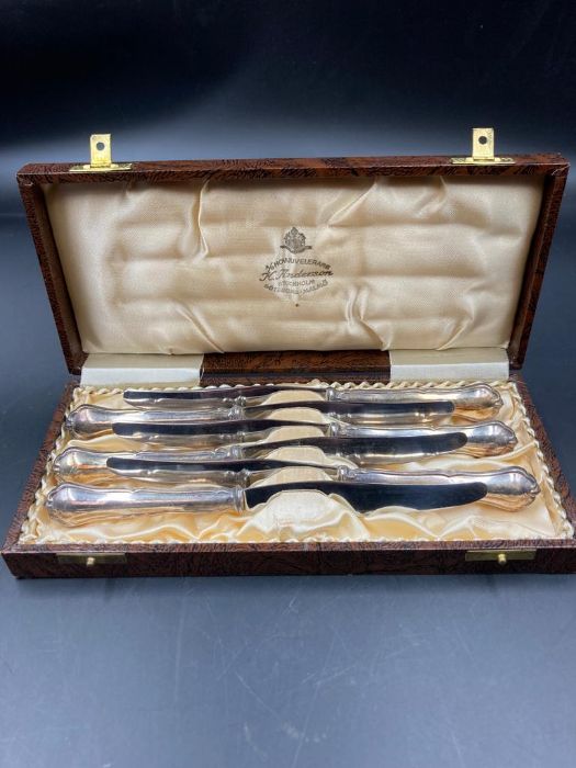 A Boxed set of six silver handled knives from Stockholm