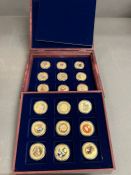 A cased set of Apollo photo coins