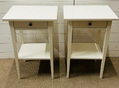 A pair of white bedsides with drawers to centre (H71cm W46cm D35cm)