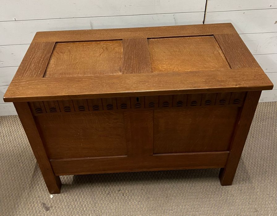 An oak coffer or blanket box with two panels front and lid (H60cm W86cm D44cm) - Image 2 of 3