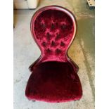 A crushed velvet slipper chair