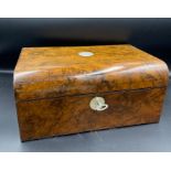 A Ladies walnut jewellery box with mother of per cartouche and lock mount.