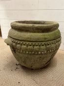A weathered garden pot with handles to sides (H37cm Dia50cm)