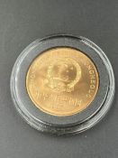 A copper 1993 Chinese Copper 5 Yuan Panda coin in capsule