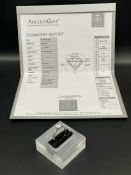 A Round Brilliant 0.71ct Diamond with supporting Anchor Cert Report set in 18ct white gold ring size