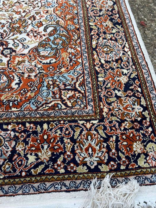 An Indian hand knotted silk rug - Image 2 of 5