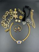 A selection of quality costume jewellery including brooches, earrings and several necklaces.