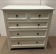 A white two over three contemporary chest of drawers (H99cm W95cm D50cm)