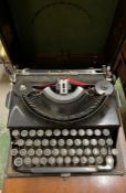 A cased Imperial type writer