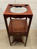 A mahogany wash stand with cut out for bowl etc