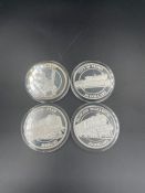 Four Various Turks and Caicos silver £20 Dollar coins celebrating the Evening Star locomotive,