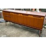 A Mid Century Teak G Plan Fresco sideboard on hairpin legs