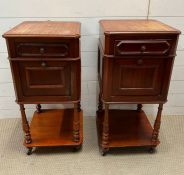 A pair of 19th century mahogany bedsides with drawer and cupboard below. On turned supports and