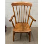 A Windsor chair with spindle back.