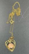 A 14ct gold necklace and heart shaped pendant ( Approximate Total Weight 1.9g)