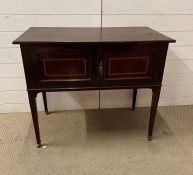 A Maple and Co mahogany cabinet (H78cm W93cm D46cm)
