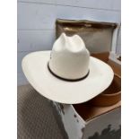 A Resistol western hat, boxed natural 73/8. San antone, Stetson