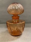 A large Faberge amber glass "Fleurs Ou Monde" factice perfume bottle