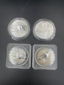 Four Australian 1oz silver coins