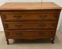 An oak three drawer chest of drawers (H80cm W105cm D47cm)