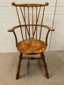 A stick back Windsor armchair (H104cm W60cm D21cm)